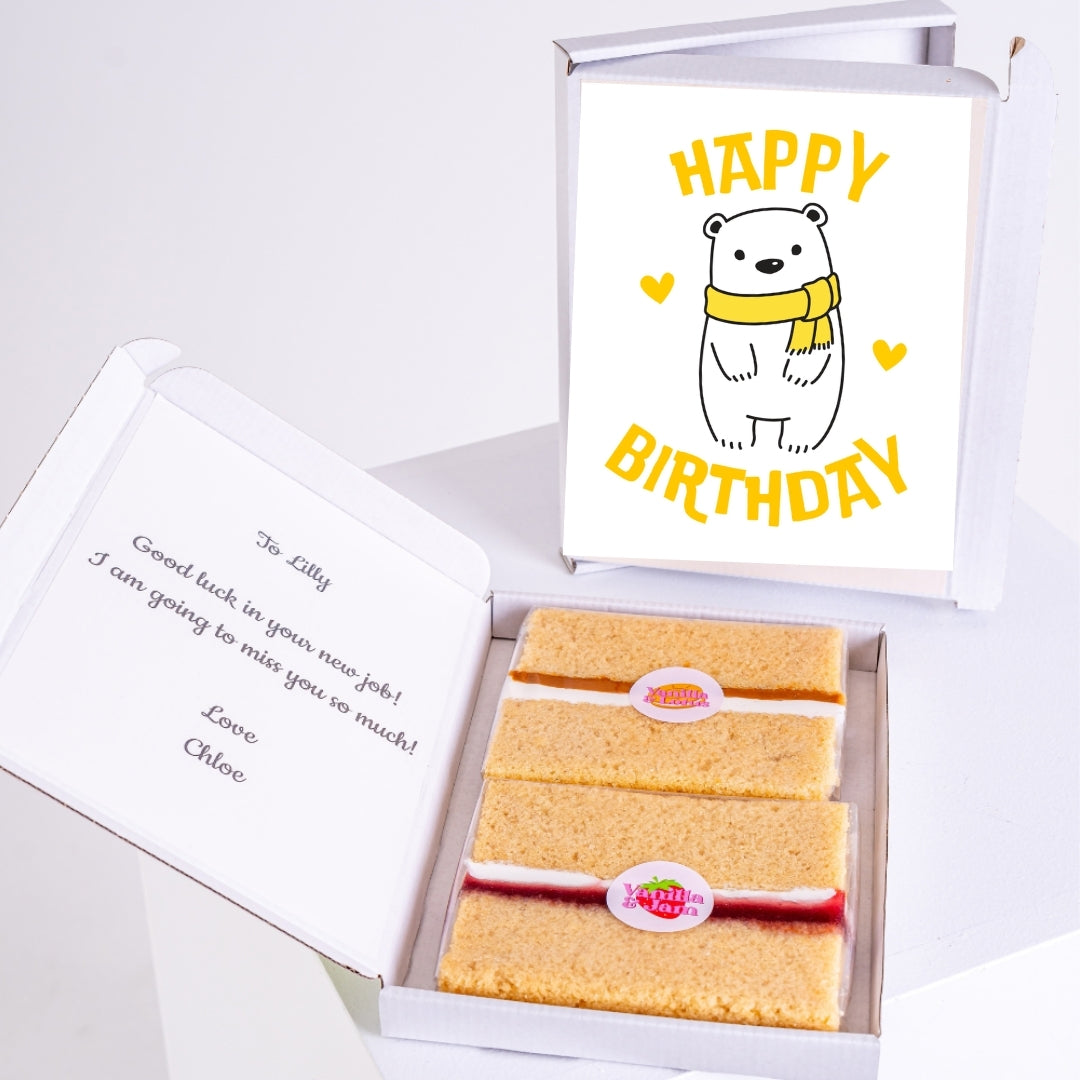 Vanilla sponge slices with a printed message inside gift box