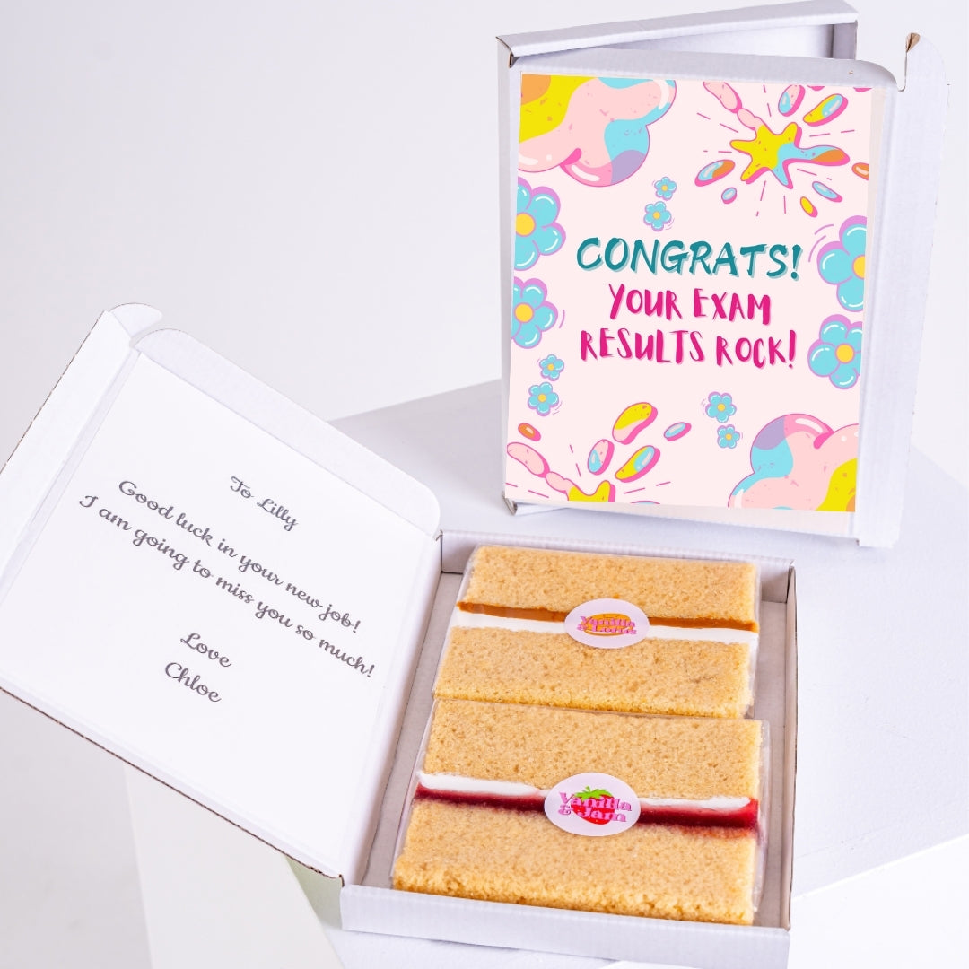 Vanilla gift box with exam results message and note.