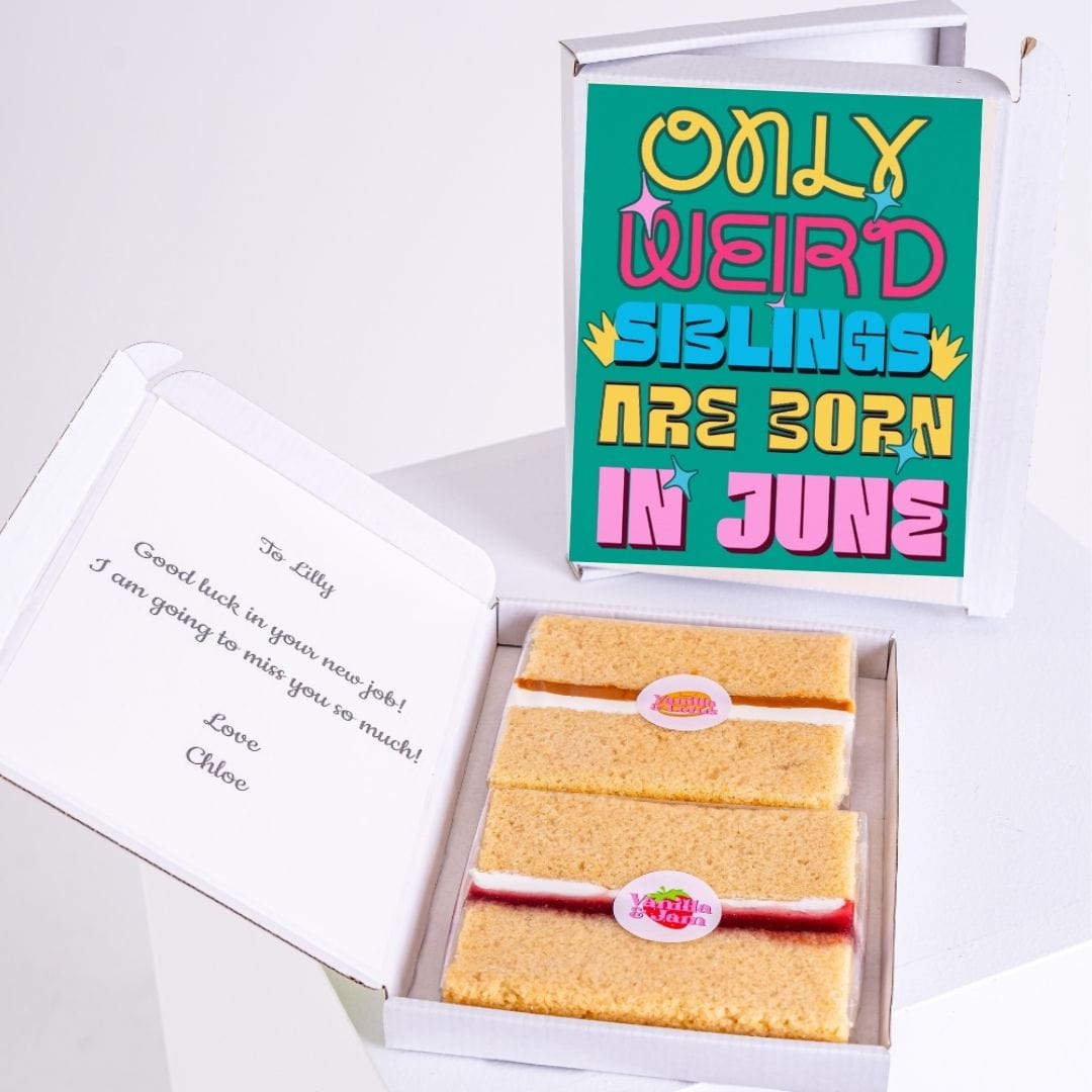 Cake slices in a box with a greeting card.
