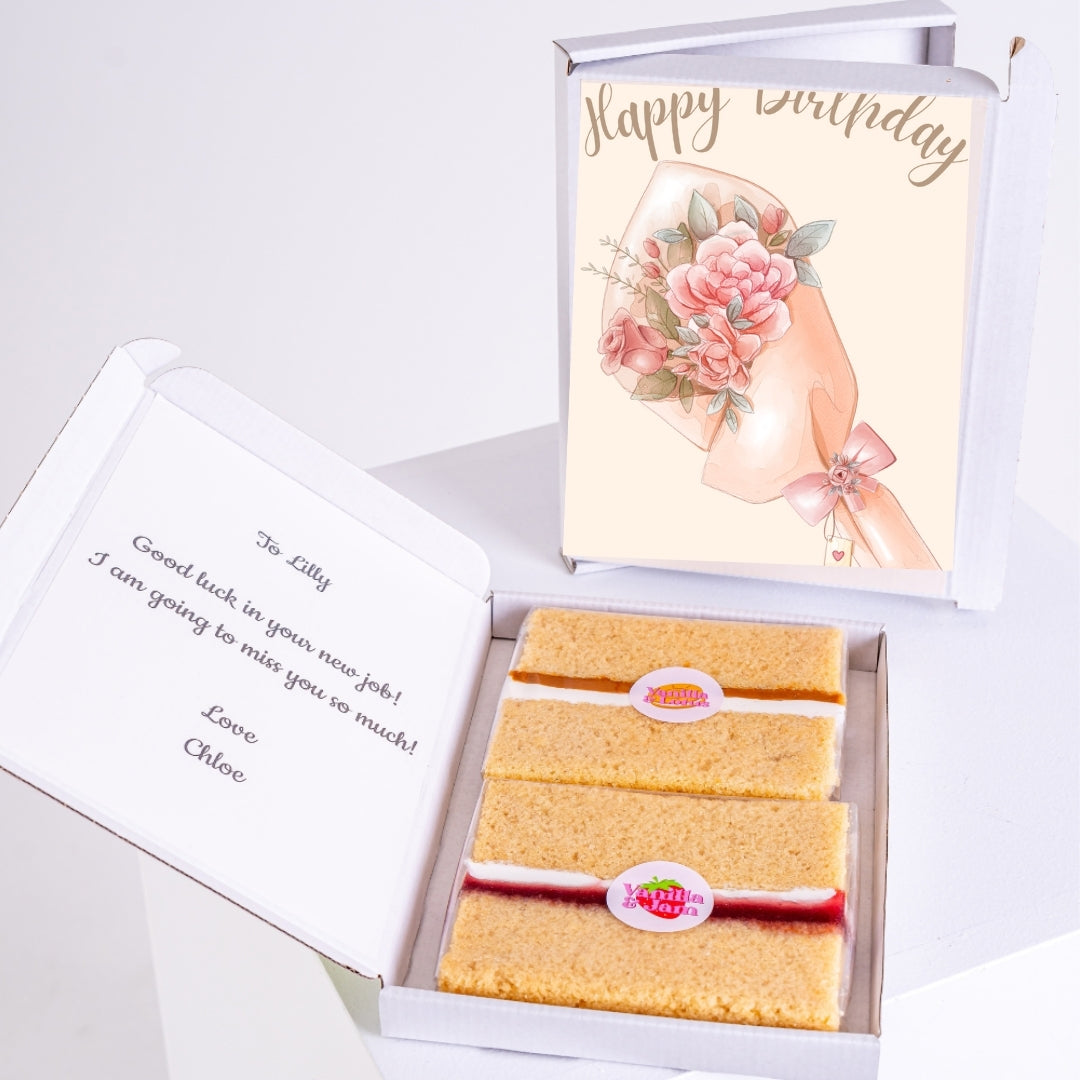 Letterbox cake with pink floral birthday design