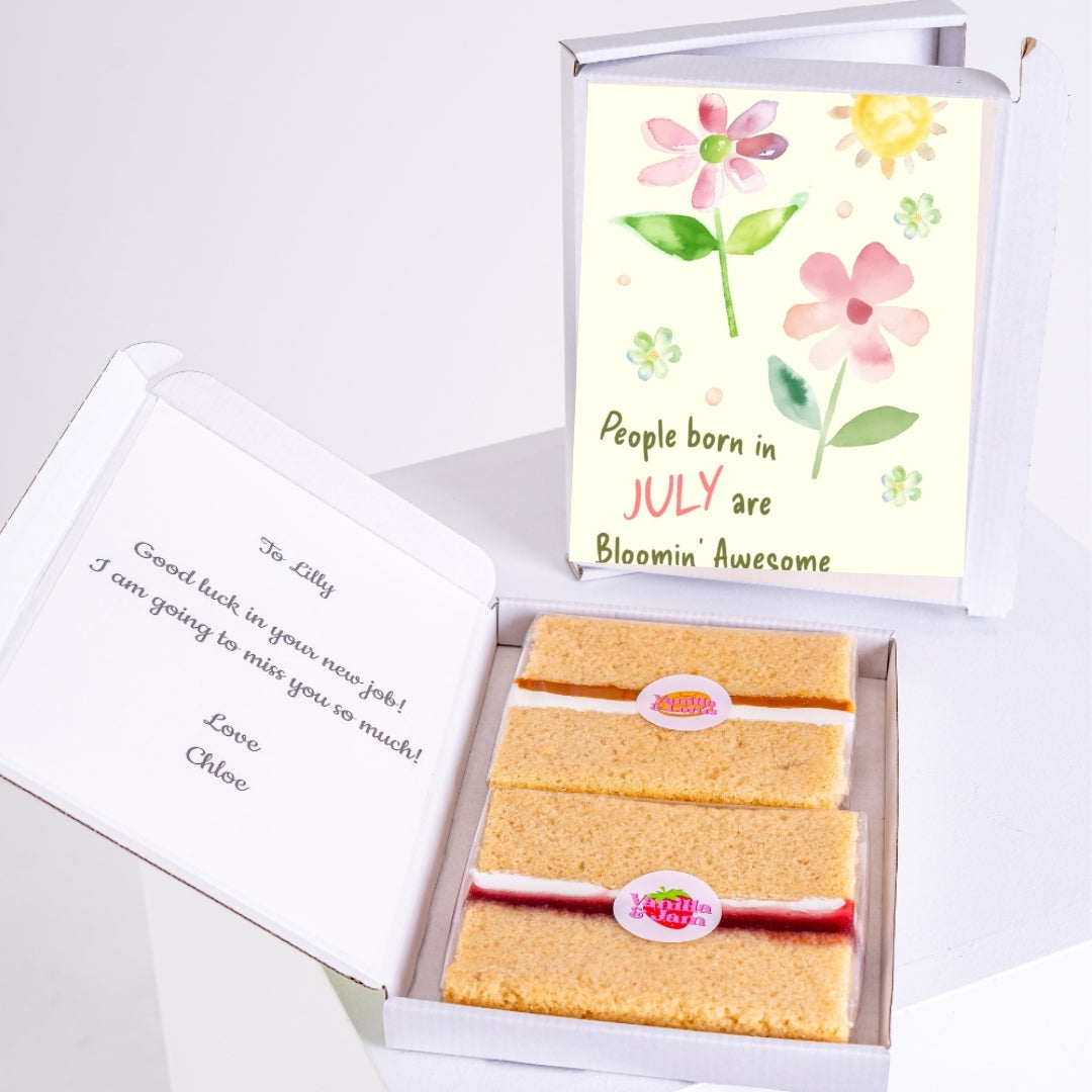 Letterbox cake with July birthday floral design and sponge slices