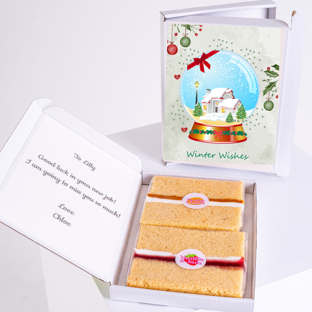 Gift box with cake and winter wishes card