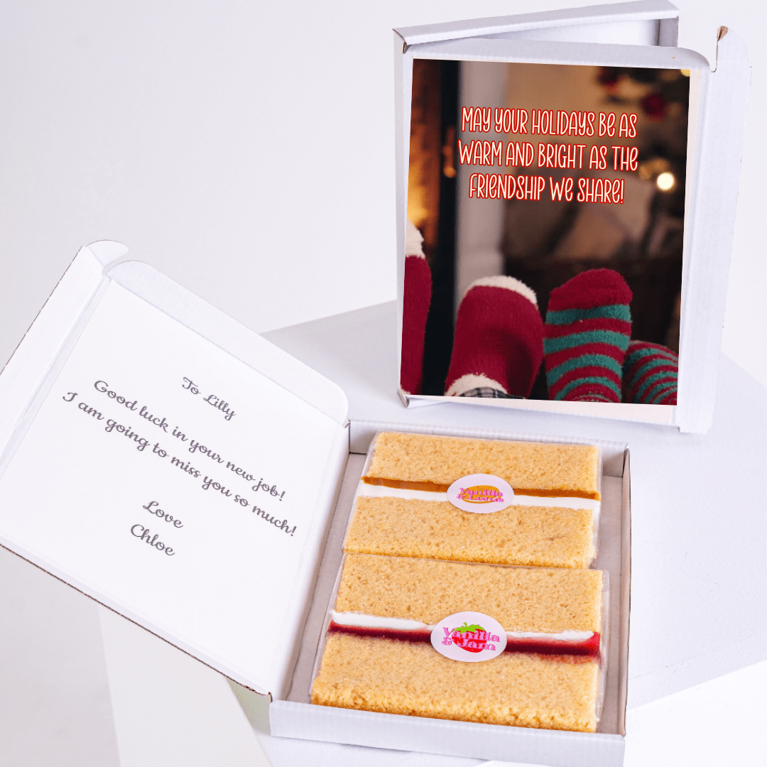Cake slices in a gift box with a photo and message.
