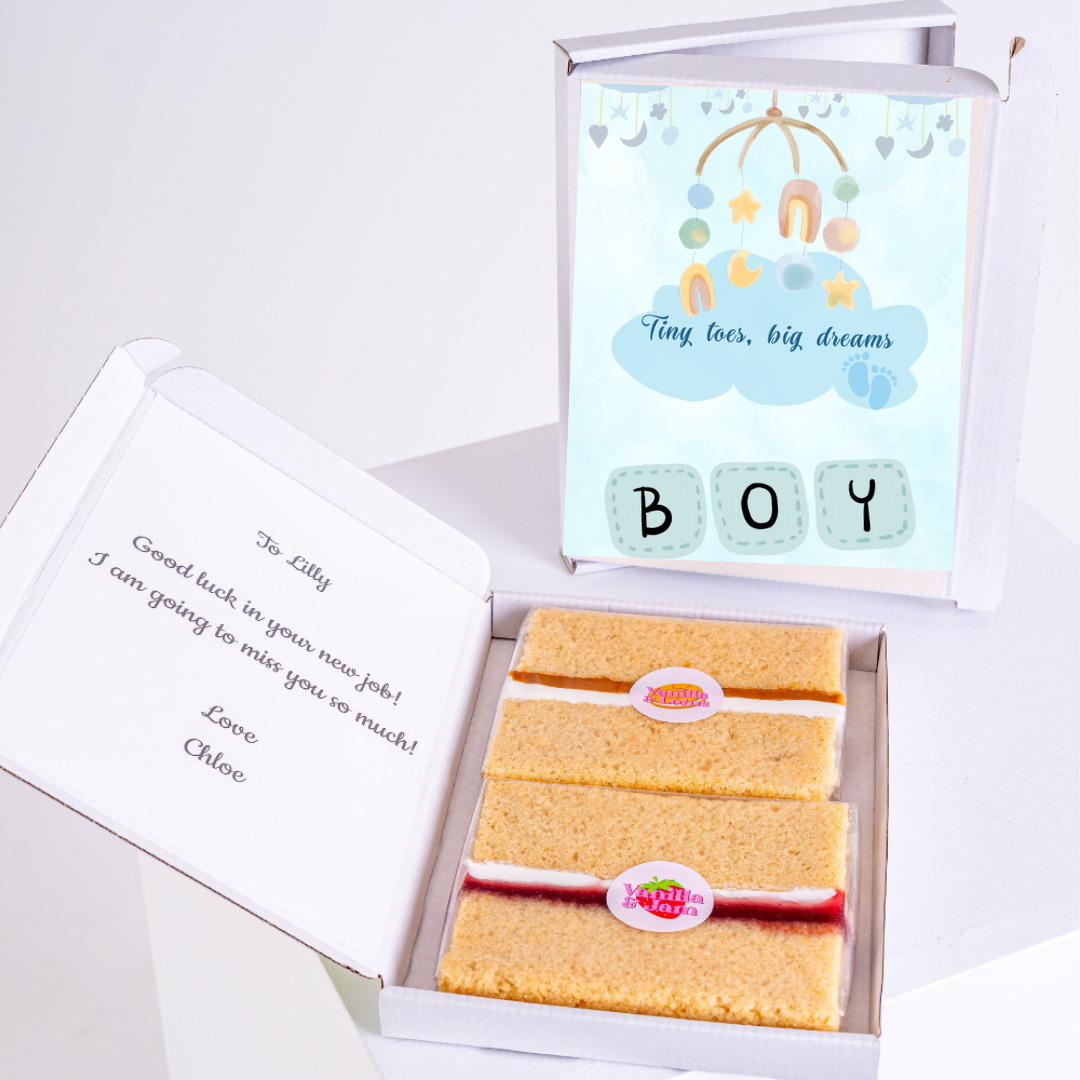 Baby boy cake gift box with Tiny toes, big dreams card.