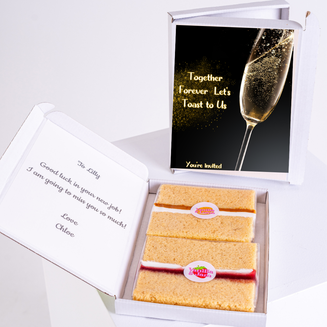 Cake gift box with champagne toast card, Good luck Lilly message.