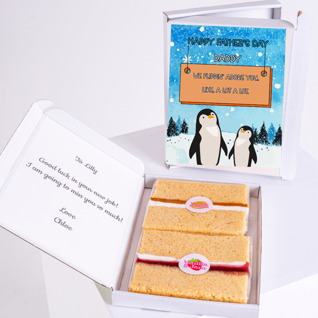 Father's Day cake card gift box featuring adorable penguin parent and child in a snowy winter scene with loving message
