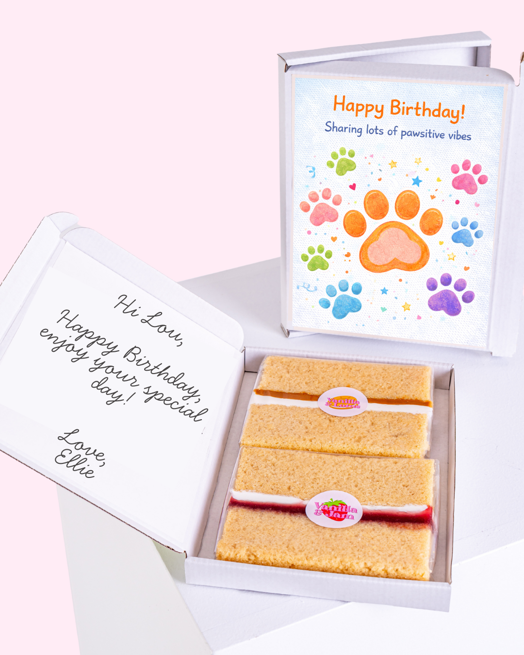 Birthday cake slice gift box with colorful paw print birthday card inside