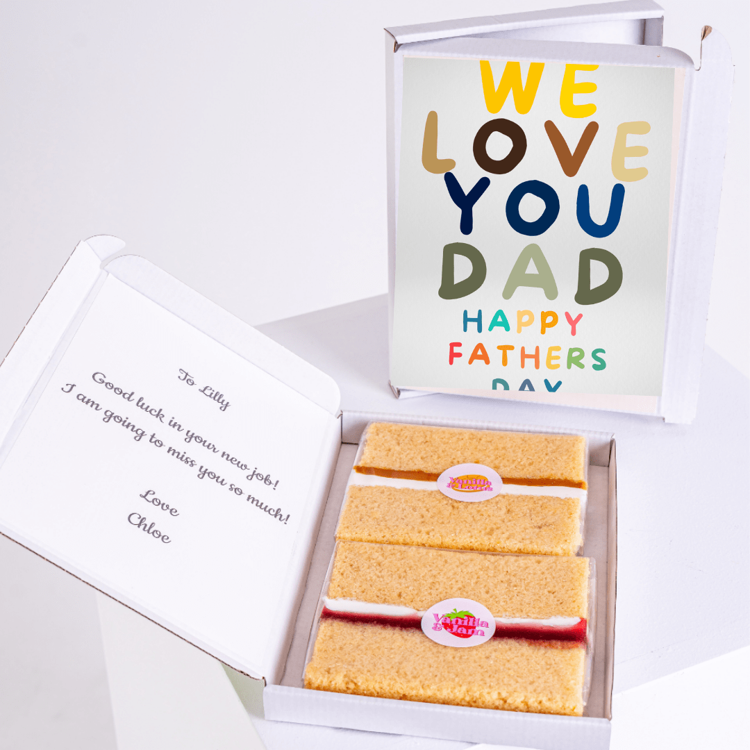 Father's Day gift box featuring colourful 'We Love You Dad' cake card with cheerful lettering