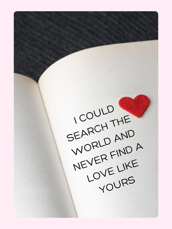 Love quote on book page with red heart