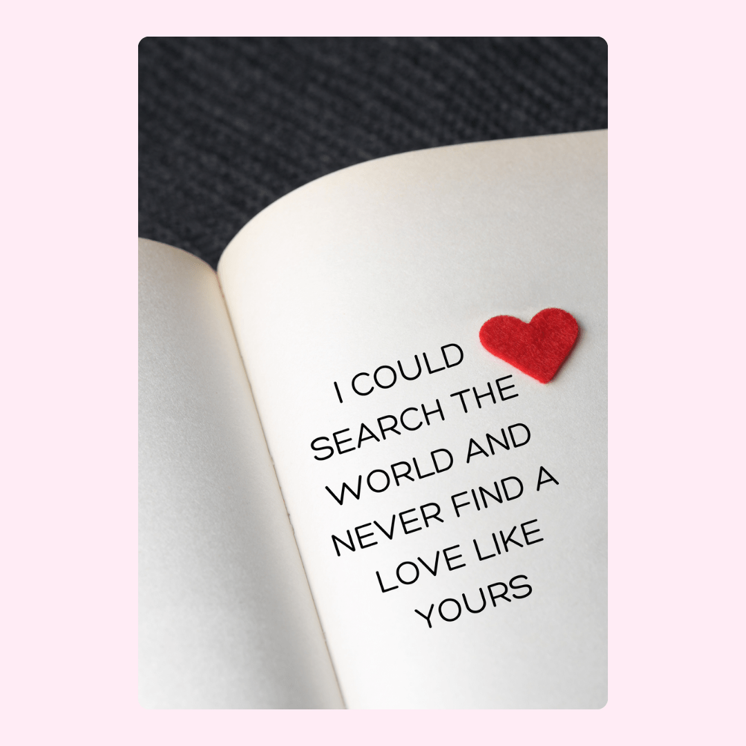 Love quote on book page with red heart