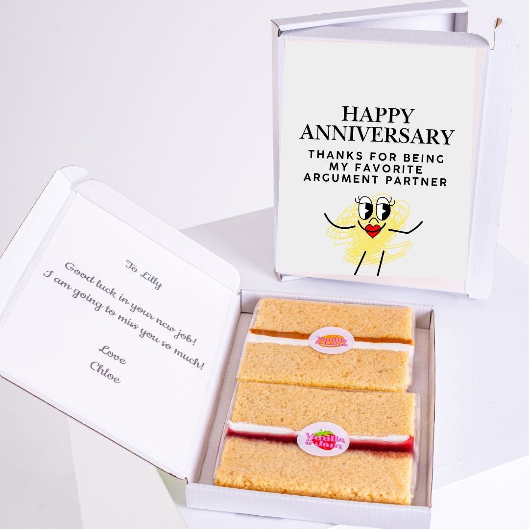 Vanilla sponge letterbox gift with “Happy Anniversary, thanks for being my favourite argument partner” message inside the box.