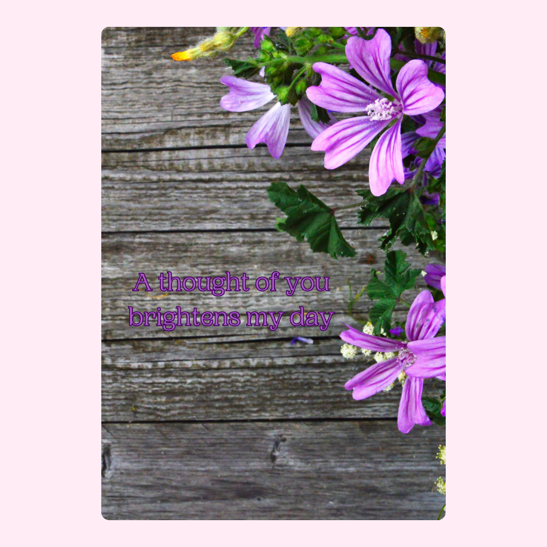 Purple flowers on wood background, A thought of you card.