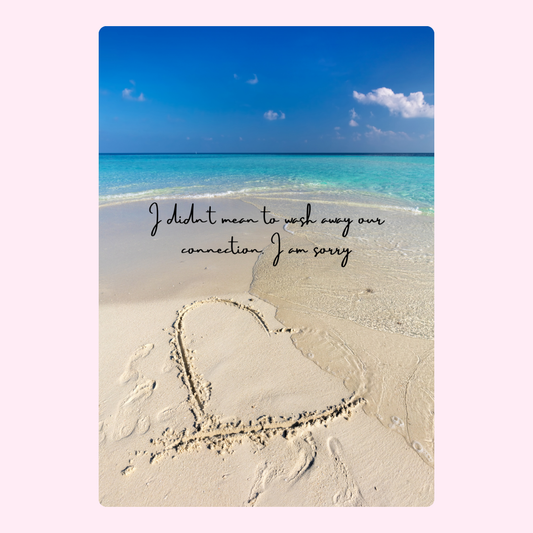 Beach scene with heart and apology message.
