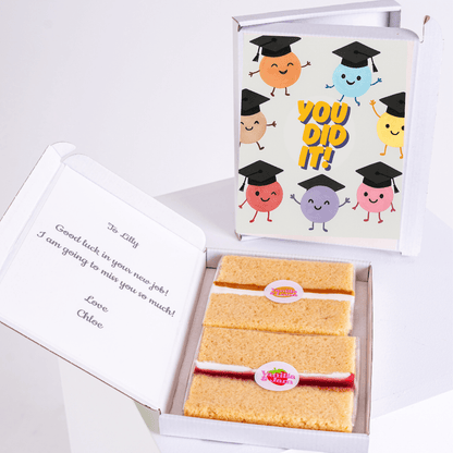Graduation cake gift box with You Did It! card and a note to Lilly.