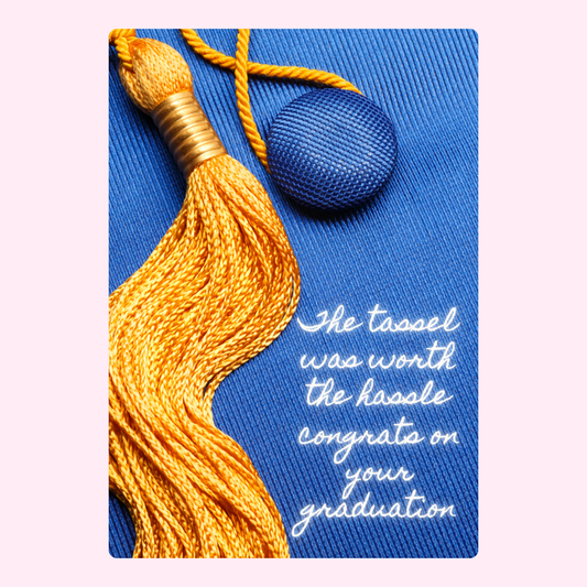 Graduation tassel & cap on blue fabric, congrats on your graduation