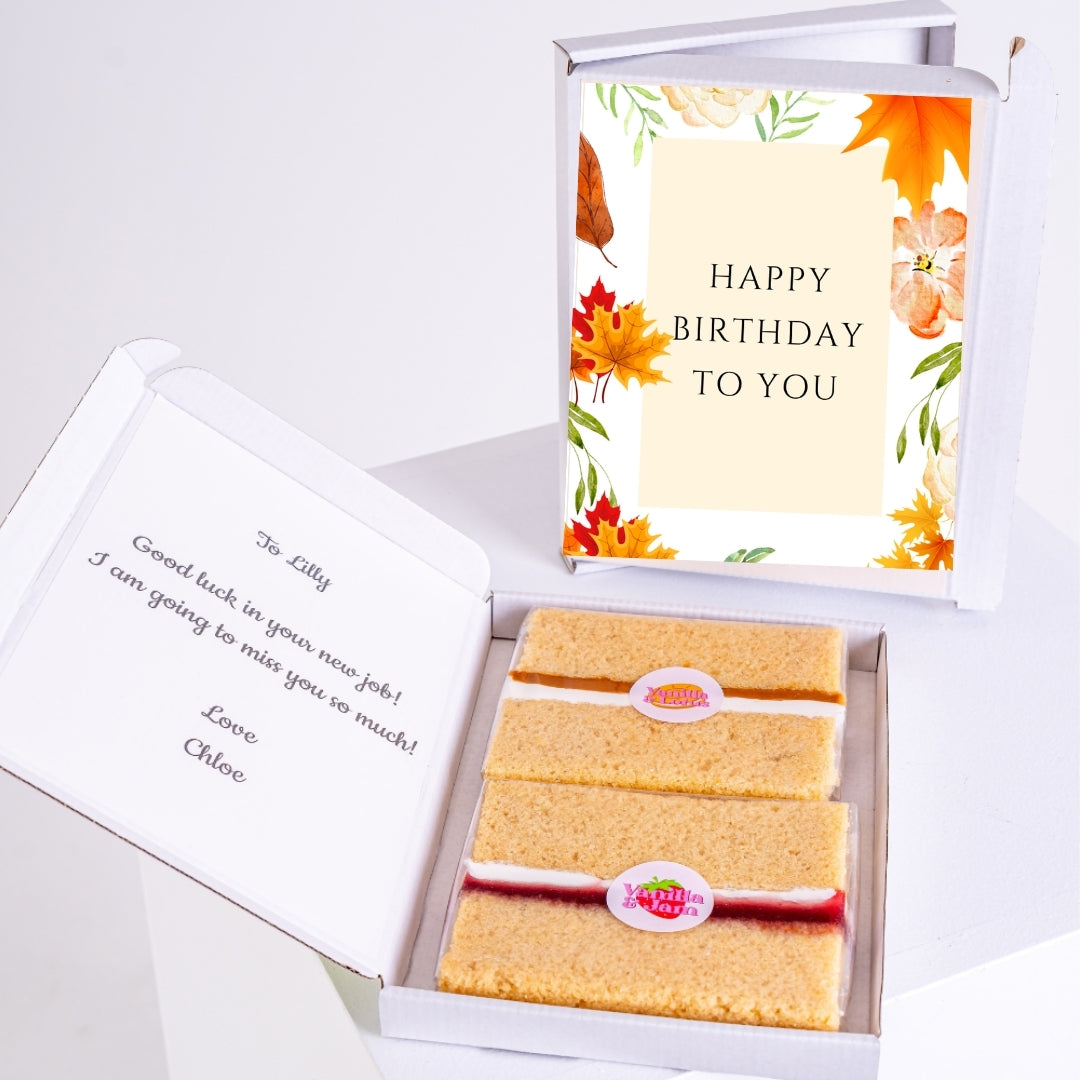 Birthday gift box with sponge cake slices and message inside.