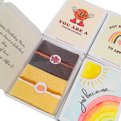 Birthday cake and cards in a gift box