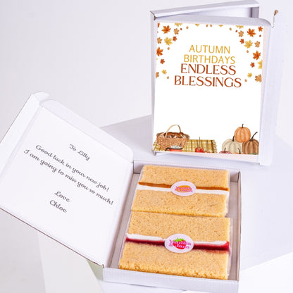 Autumn birthday gift box with sponge cake slices.