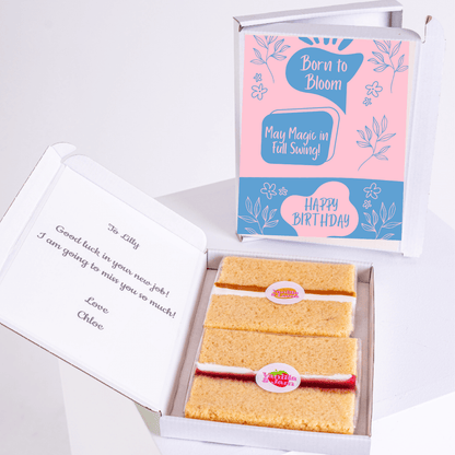 Birthday cake gift box with Born to Bloom card and handwritten note.