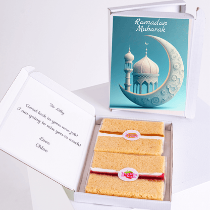 Ramadan Mubarak gift box with cake, card, and message.