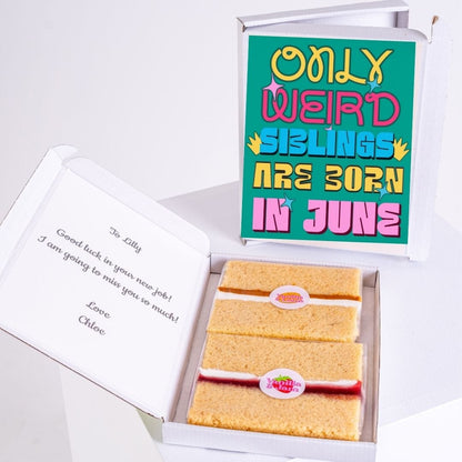 Cake slices in a box with a greeting card.