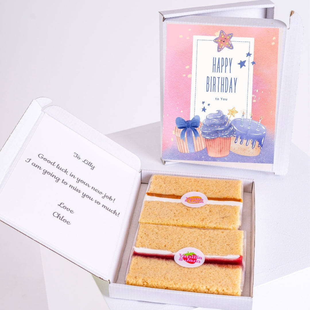Vanilla cake gift box with birthday message and purple cupcake design