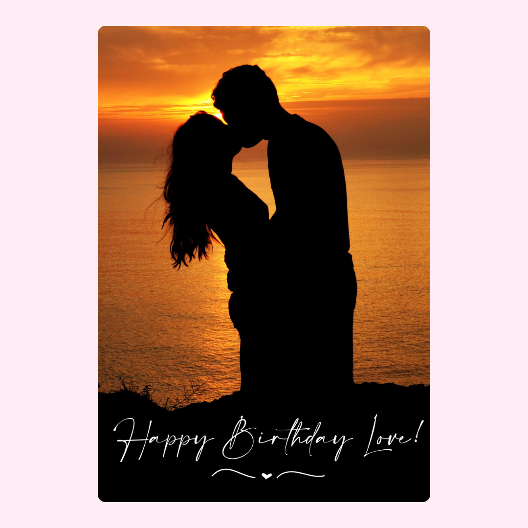 Romantic sunset birthday kiss