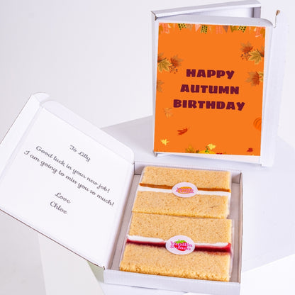Autumn birthday gift box with sponge cake slices.