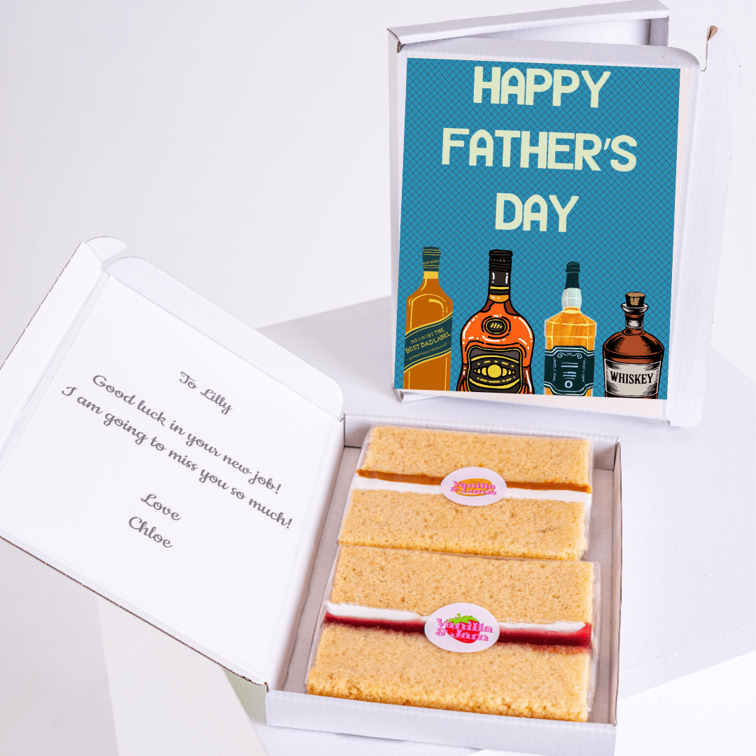 Father's Day gift box with whiskey, cake, and message to Lilly.