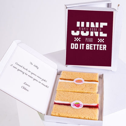 Cake slices in a box with a note and a June sign.