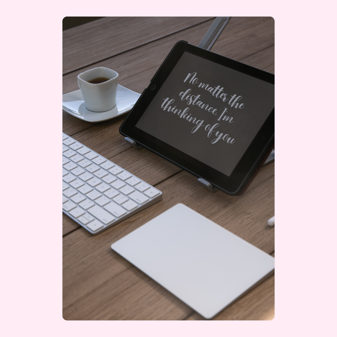 Tablet with Thinking of You quote on desk