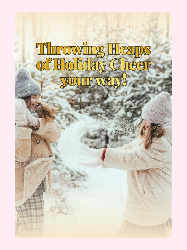 Girls throwing snow with Holiday Cheer message