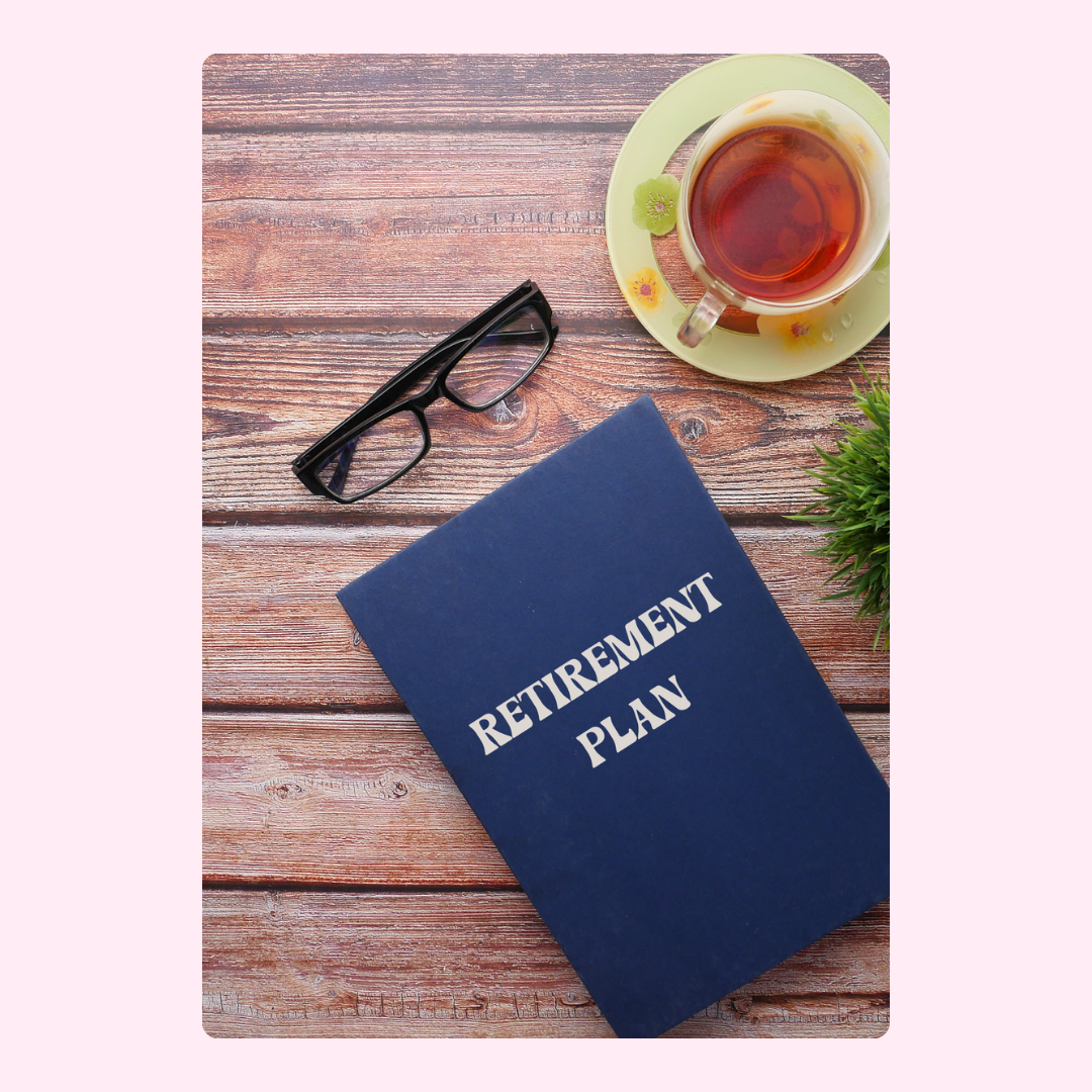 Retirement plan book with glasses and tea