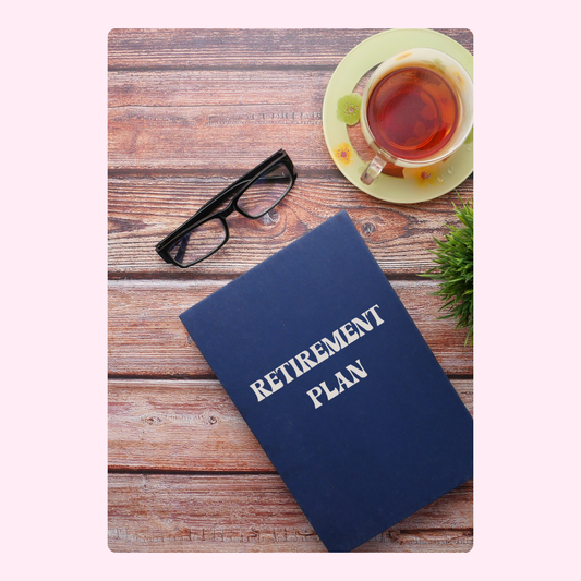 Retirement plan book with glasses and tea
