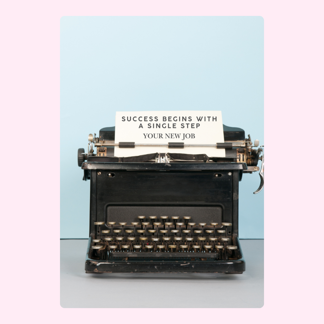Vintage typewriter with Success begins... quote, new job.