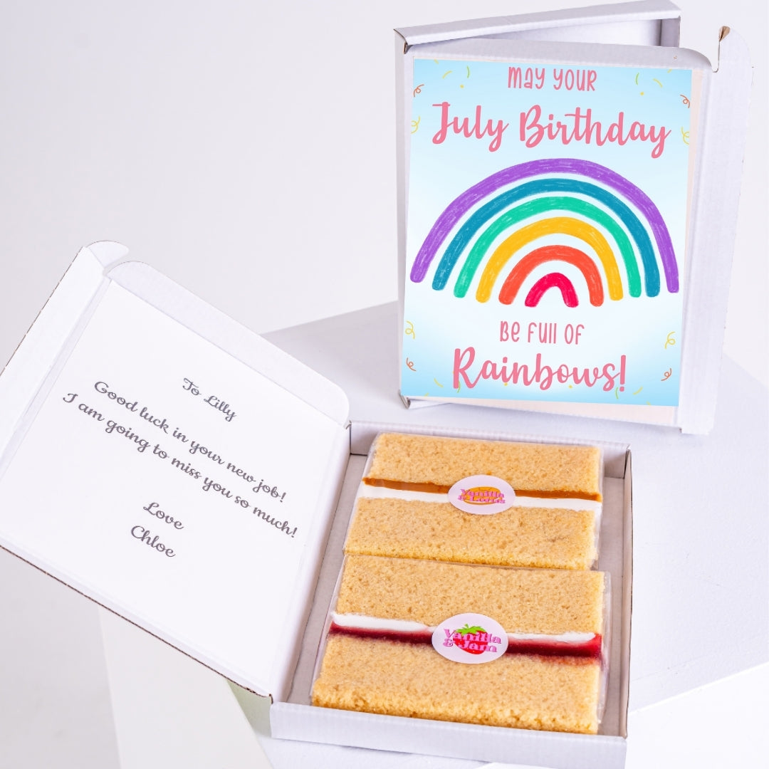 Letterbox cake gift with rainbow-themed July birthday message.
