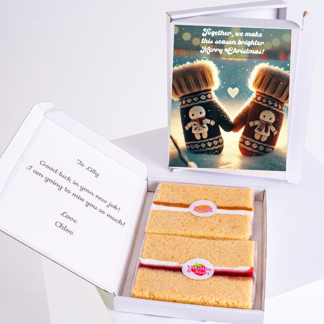 Open gift boxes with a card and baked goods.