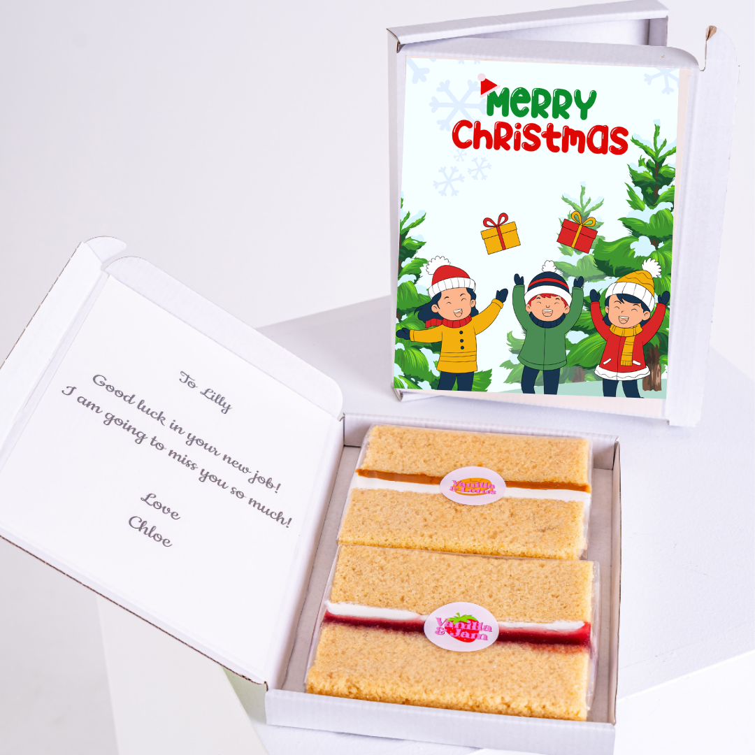 Christmas gift box with cake, Merry Christmas card, and note to Lilly