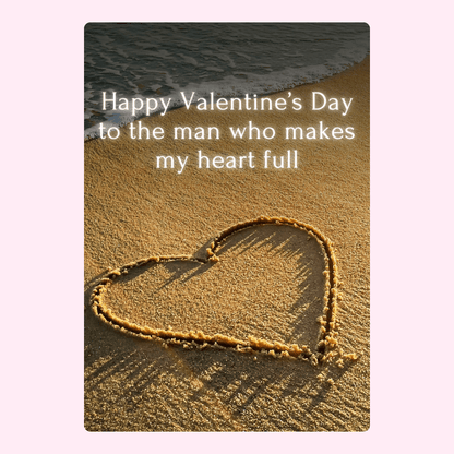 Valentine's Day message on beach with heart,...
