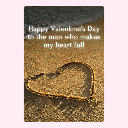 Valentine's Day message on beach with heart,...