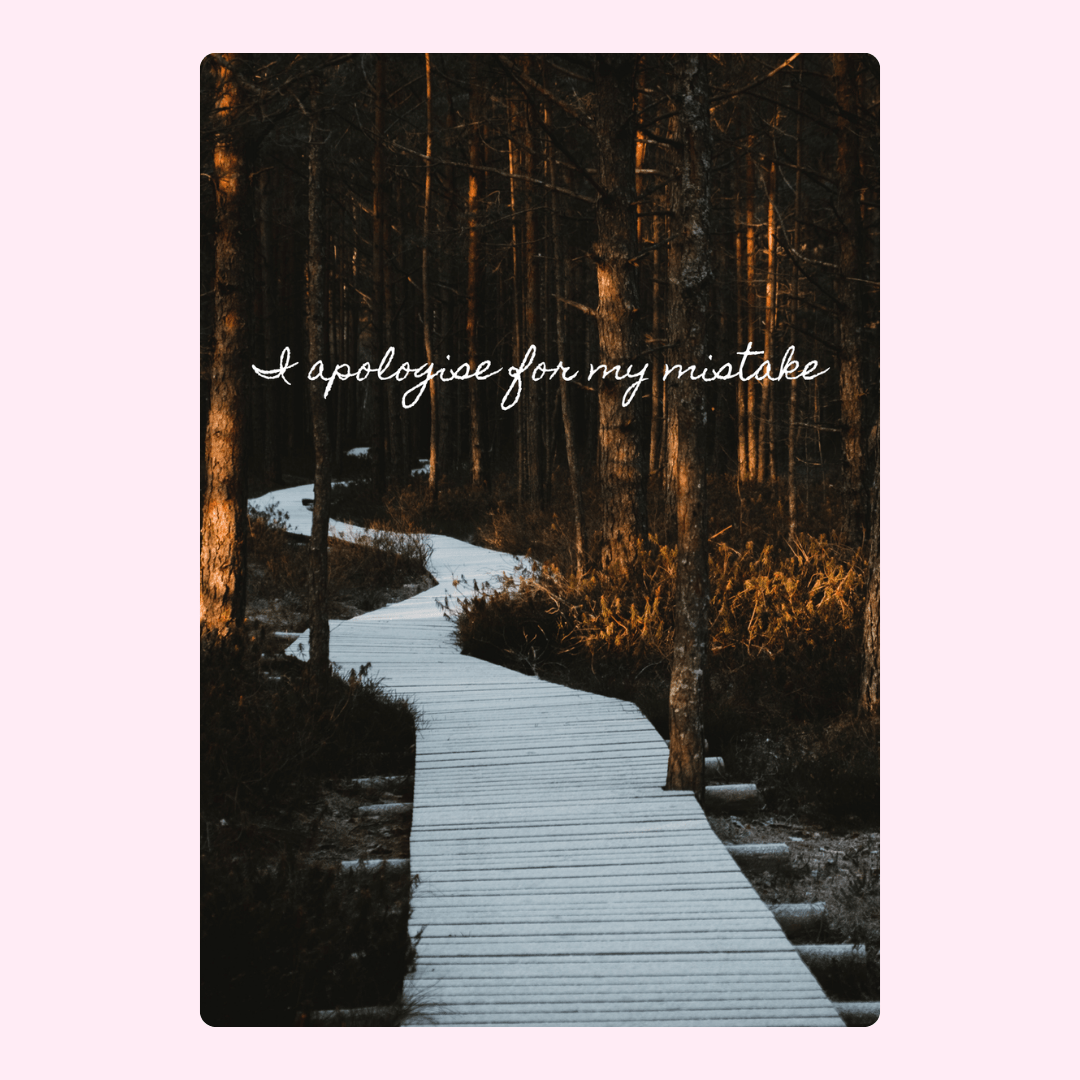 Mistake apology message on forest path.