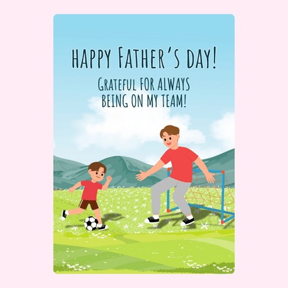 Father and son playing soccer