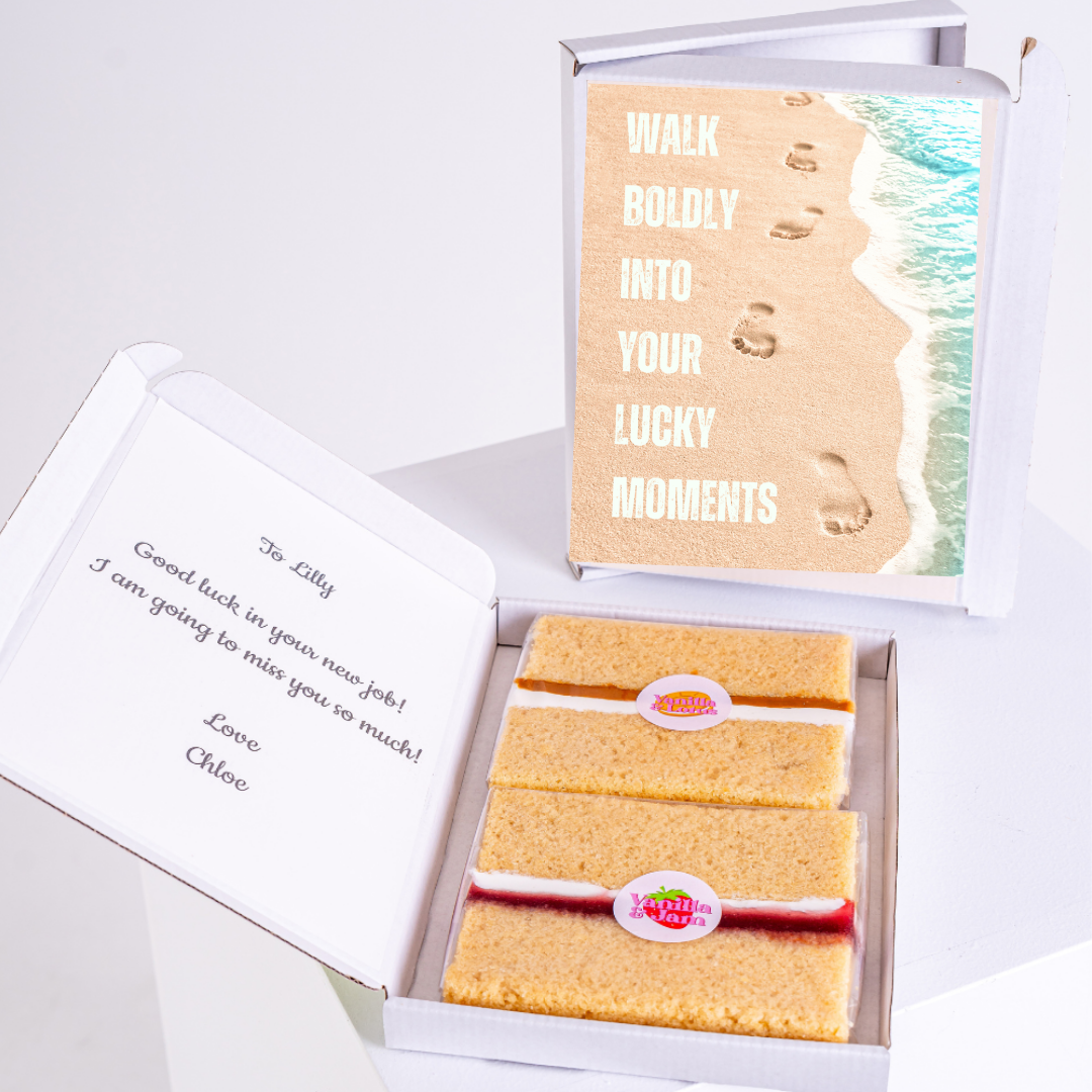 Gift box with cake and 'Good luck' card for Lilly