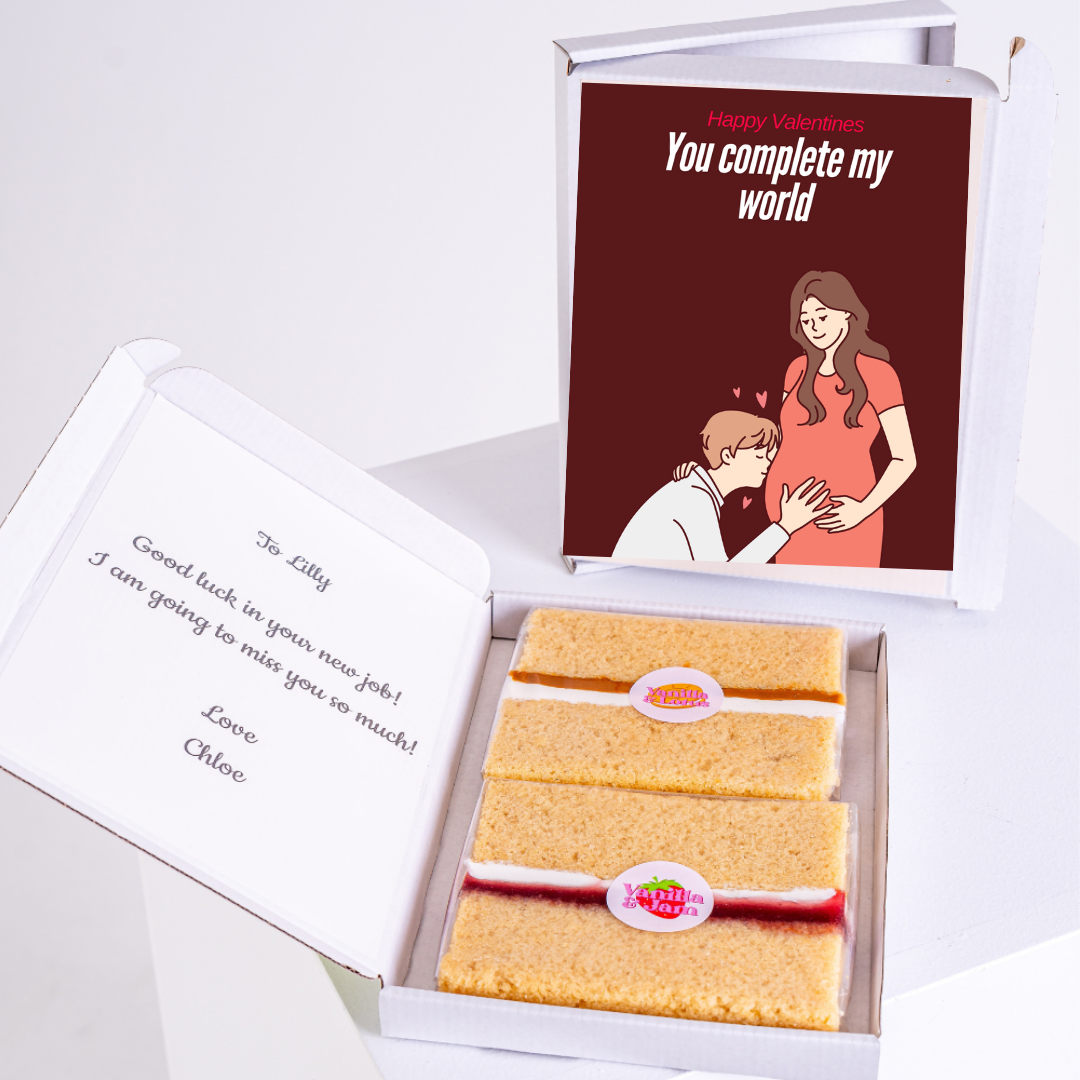 Valentine's Day gift box with cake and You complete my world card.