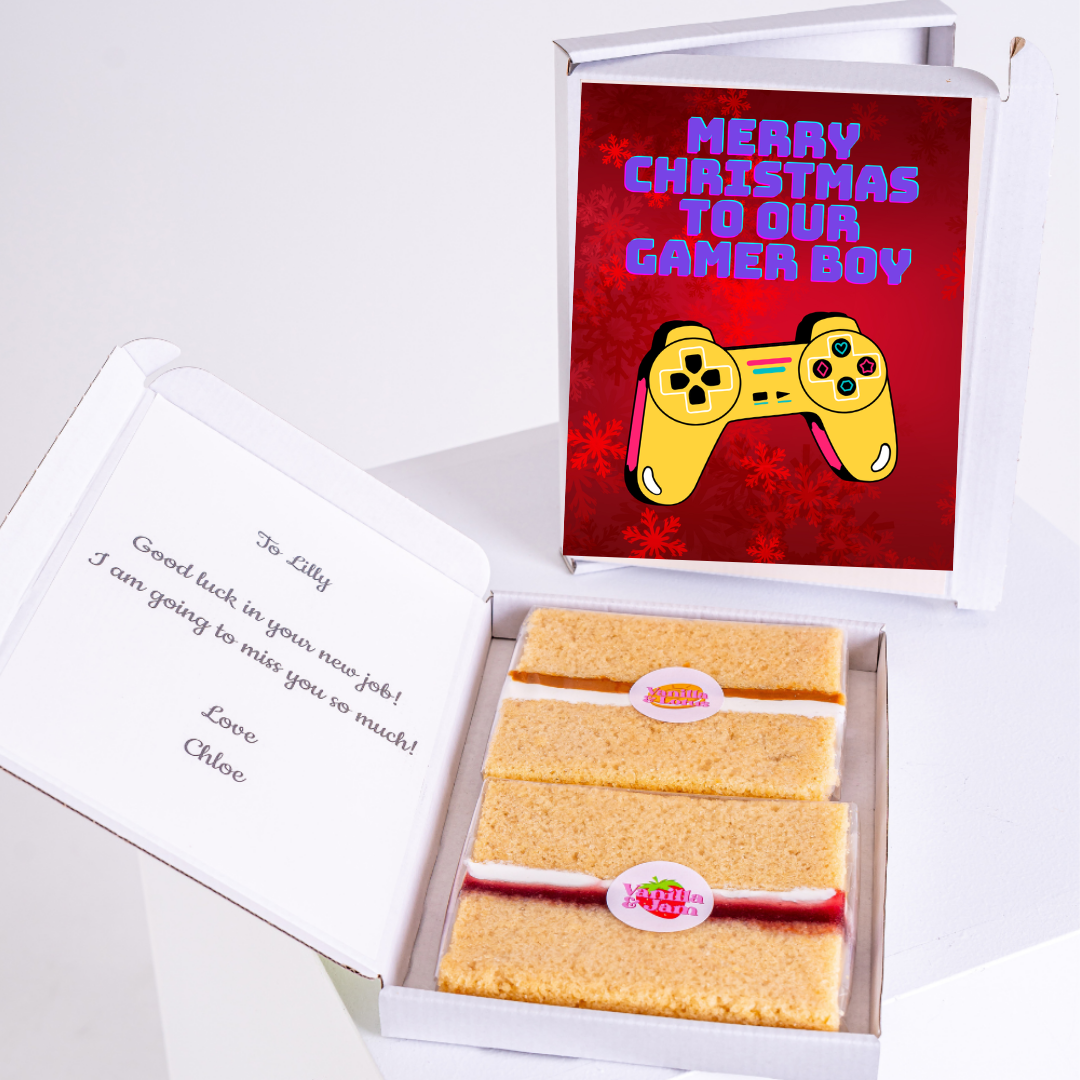 Christmas gift box for gamer boy with cake and card.