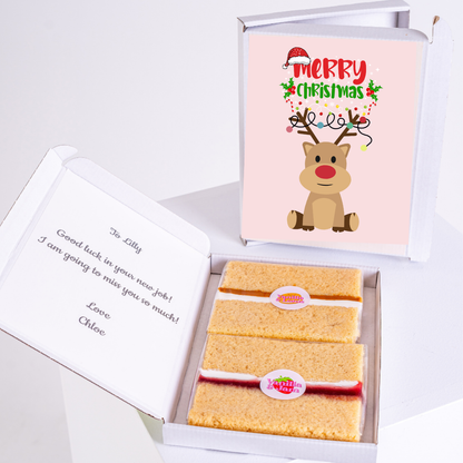 Christmas cake gift box with Merry Christmas card.