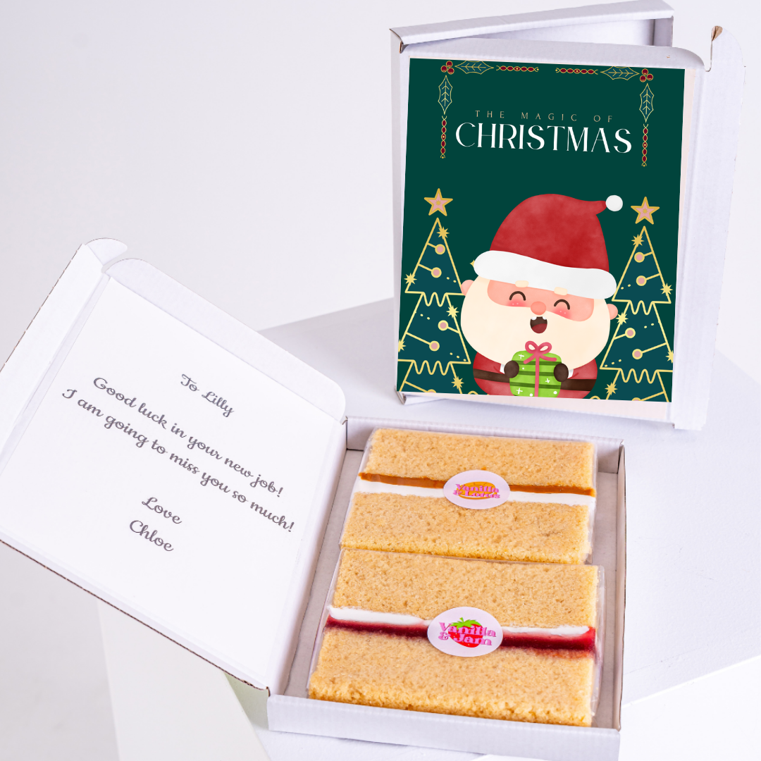 Christmas gift box with Santa and cake, The Magic of Christmas