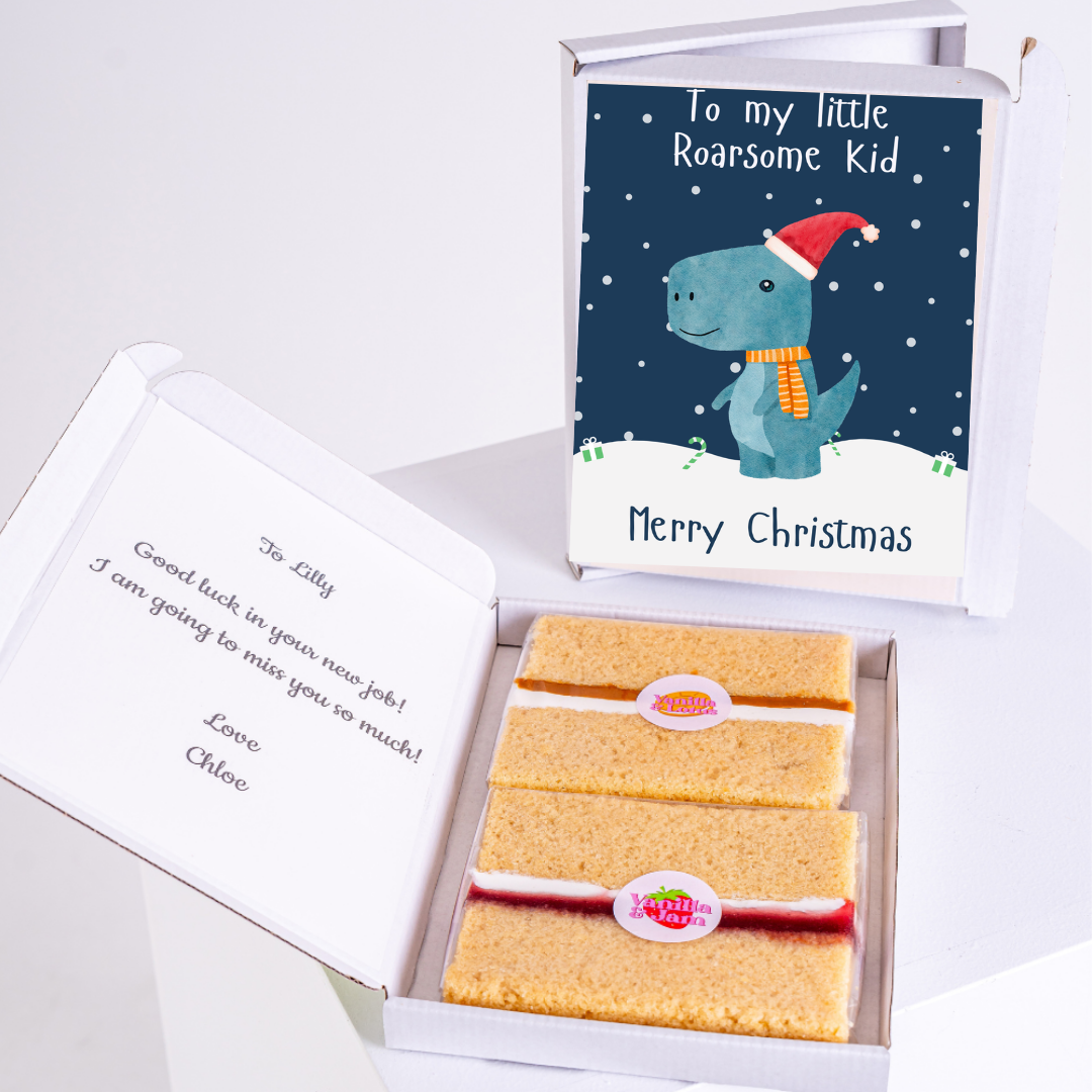 Christmas gift box for Lilly with dinosaur card and cake.