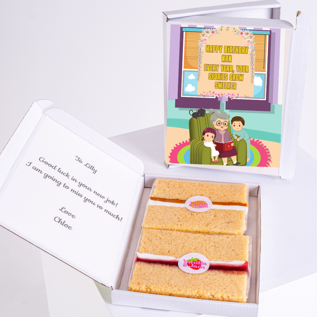 Birthday cake box with Happy Birthday card and message to Lilly.