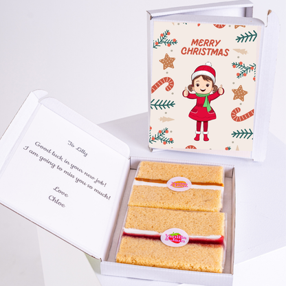 Christmas gift box with cake and Merry Christmas card